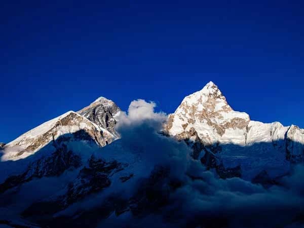 Mt. Everest with Nuptse and Khumbu Ice Fall with Smoke